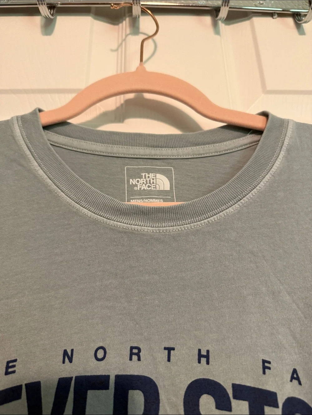 The North Face Sage Green Tee with Navy 'Never Stop Exploring' Print